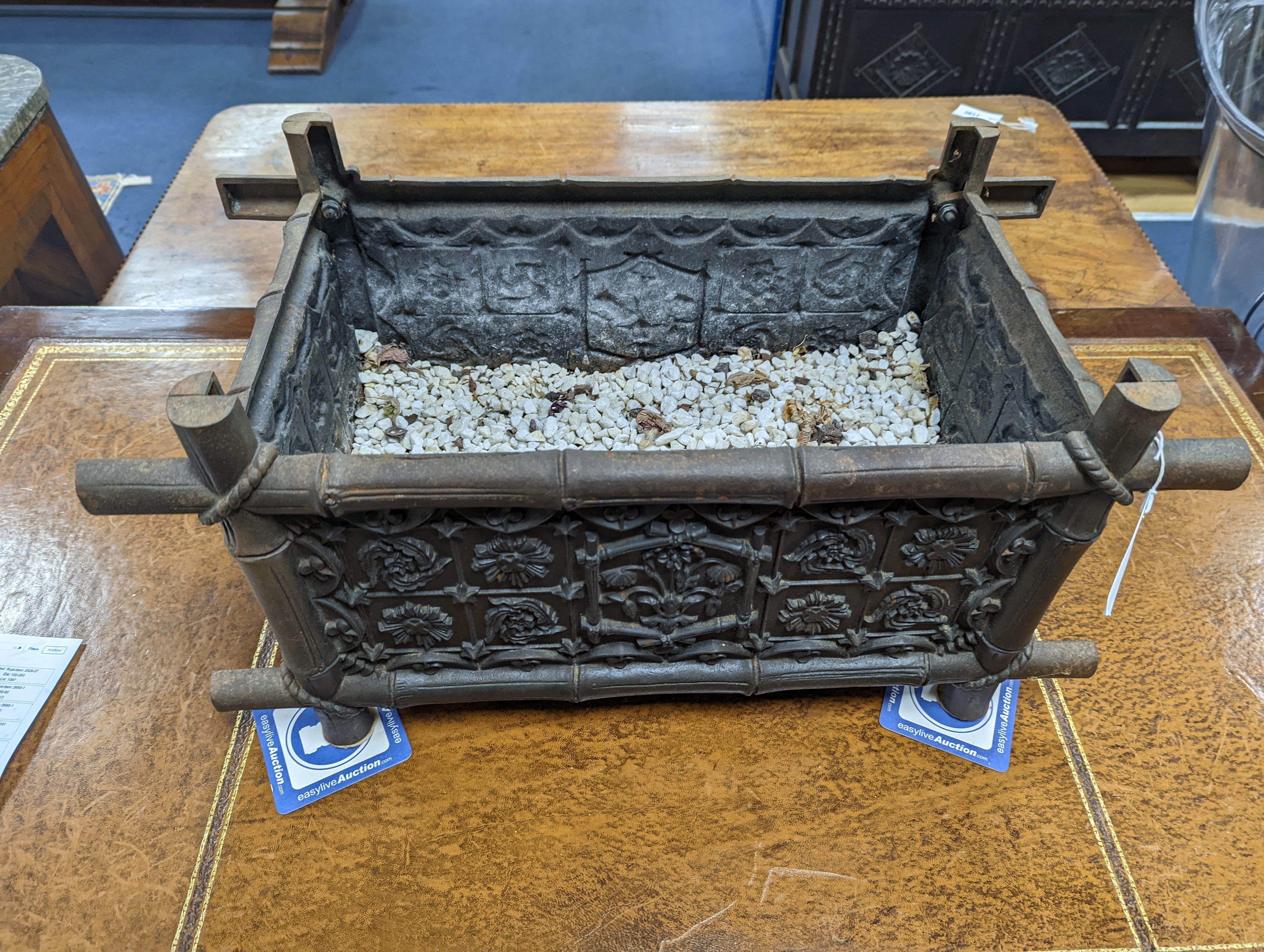 A rectangular Victorian style faux bamboo cast iron planter, width 60cm, depth 30cm, height 32cm